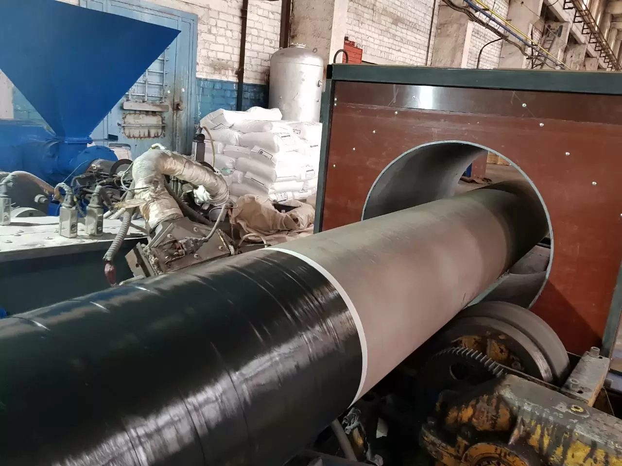 Антикорозійна ізоляція труб і деталей трубопроводу моношаровим покриттям на основі екструдованого поліетилену